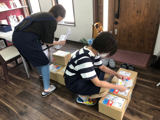 店舗にて出荷の様子